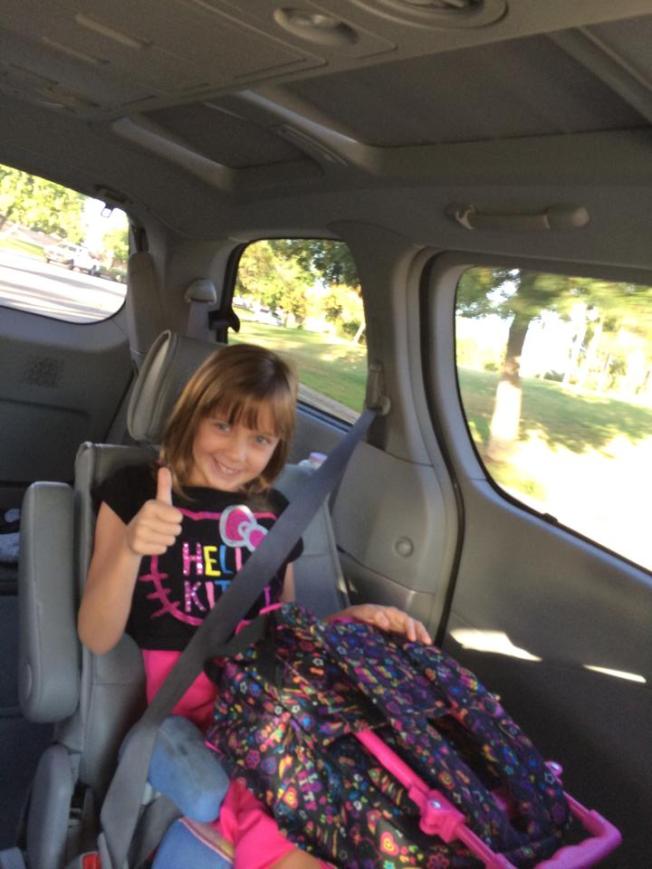 Sage getting ready for a long weekend with Grandma, & Papa 