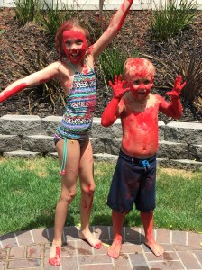 Sage & Nolan playing in red paint! Summer 2015