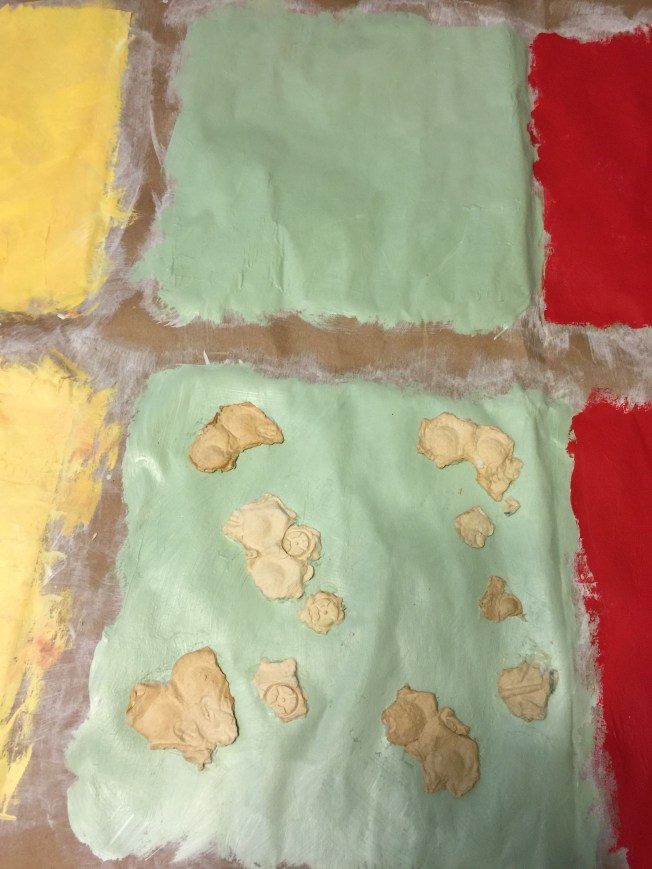 Soaked egg carton, flattened for texture.....we'll see! 